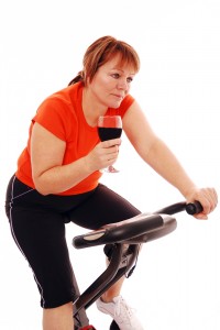 LADY ON BIKE WITH WINE